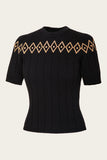 BUTIK KUBIK’s Emmy - The Darling Diamond Top in black features short sleeves, a fitted silhouette, and chic yellow diamond patterns across the chest and sleeves, evoking the timeless style of 1930s and 1940s knit jumpers.