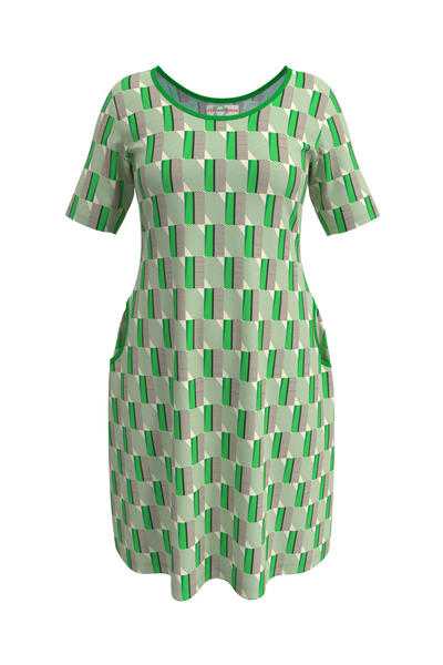 The Cissi och Selma Magda dress Brygga by BUTIK KUBIK features a geometric pattern in green, beige, and black on white. Made from ekologisk bomull, it includes a round neckline and side pockets.