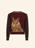 Palava Vera long eared owl cardigan in maroon organic cotton, featuring a large long-eared owl design on the back and a green and maroon jacquard knit checkered pattern on the sleeves.