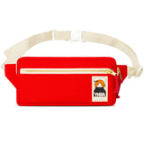 A red YKRA Fanny pack by BUTIK KUBIK, made of cotton canvas, featuring a white adjustable strap, gold zipper, front pocket, and a logo patch with a mountain and sunset design.